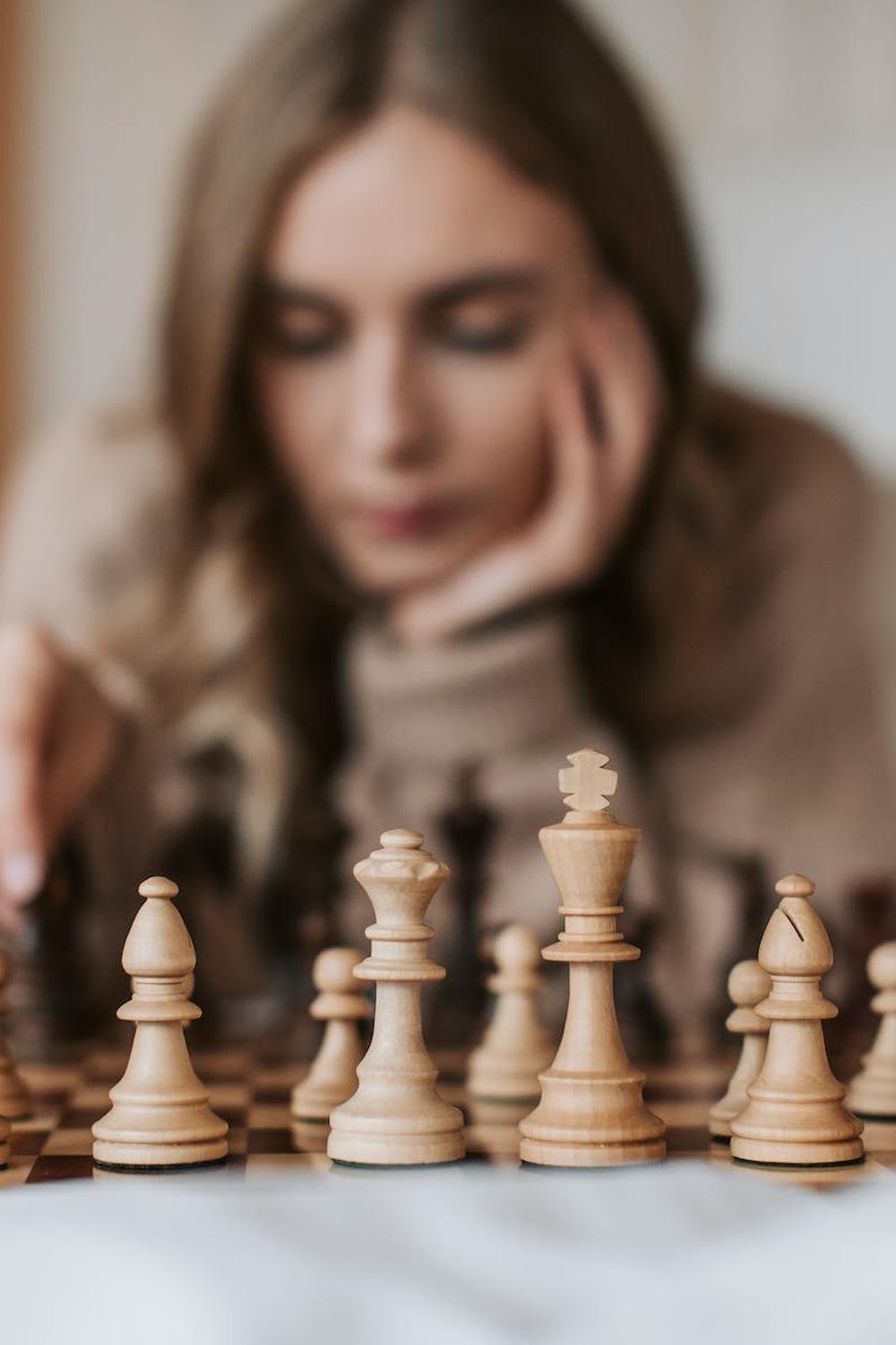a_woman_playing_a_game_of_chess