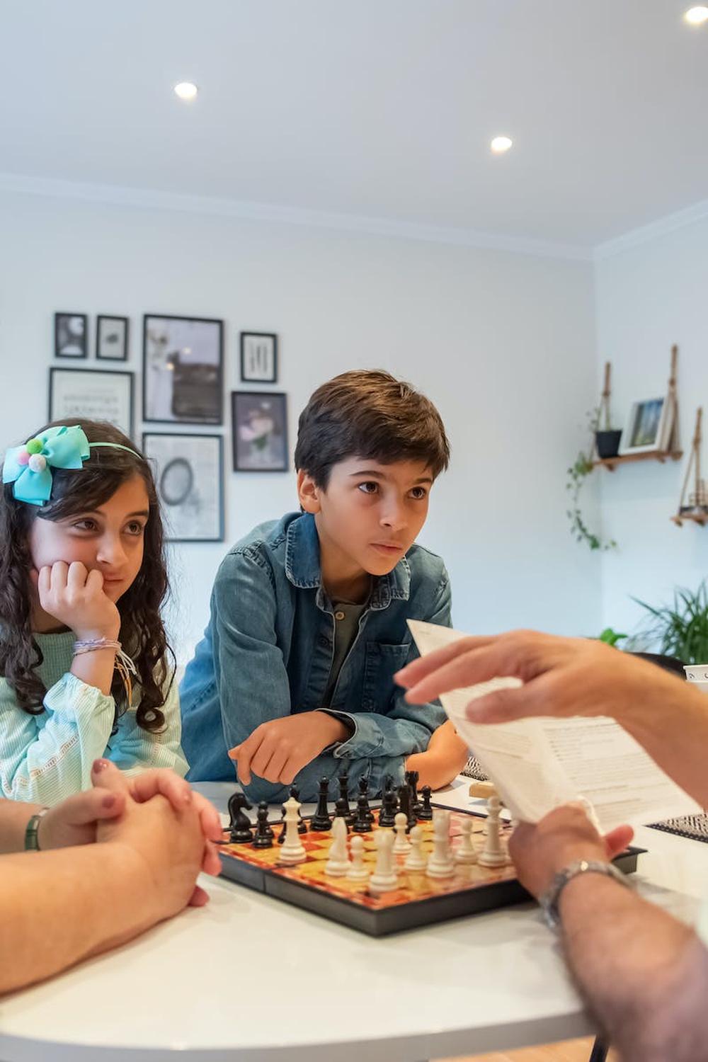 people_playing_chess_on_table