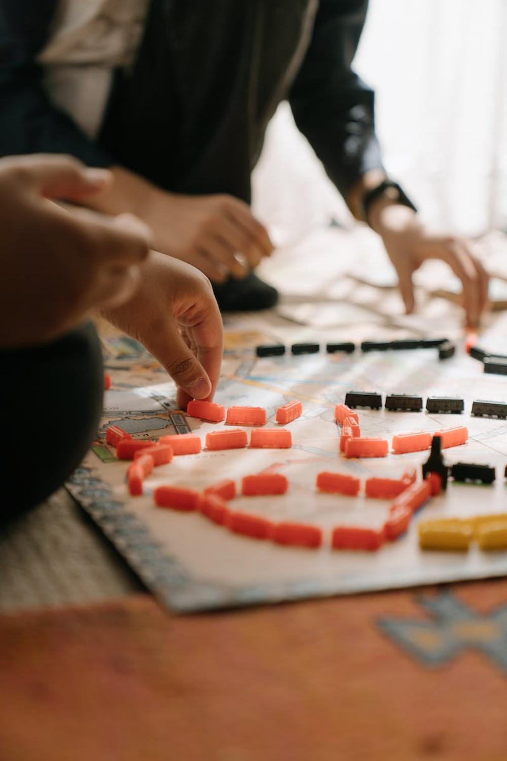 person_playing_chess_on_table