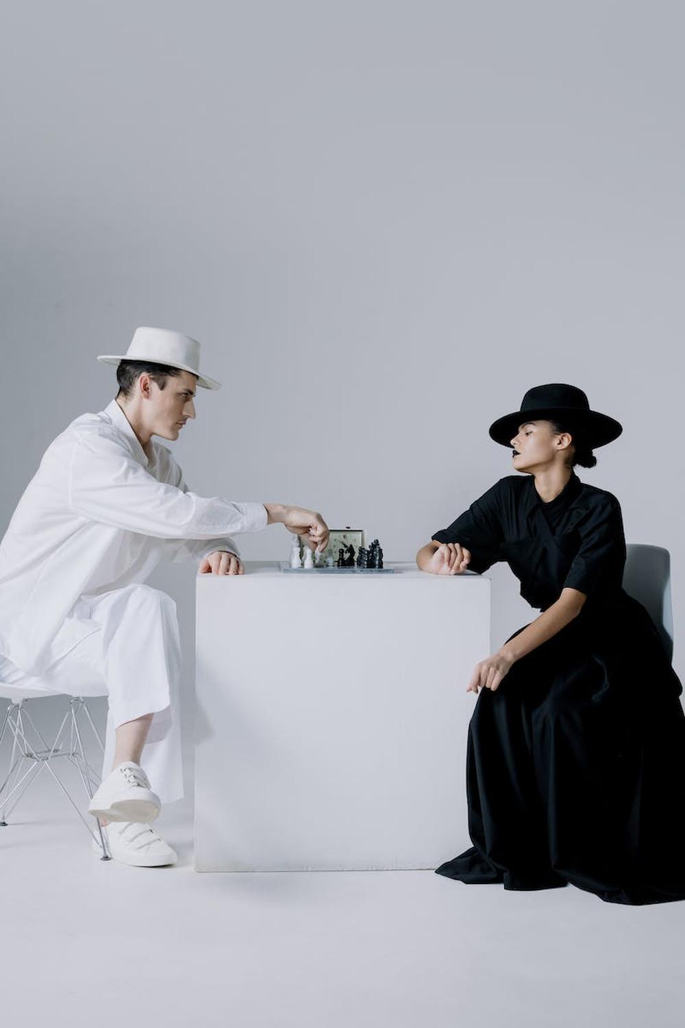 stylish_man_and_woman_playing_chess